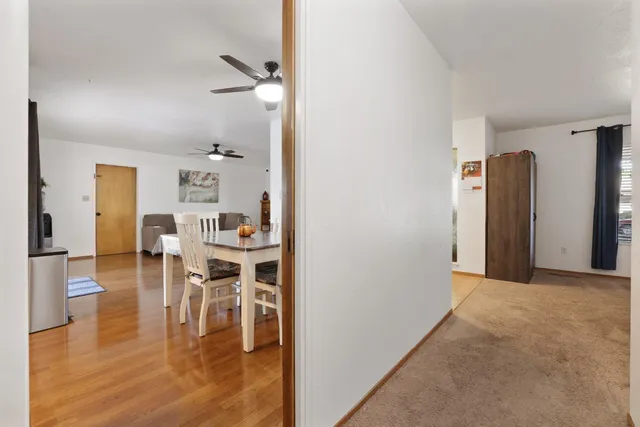 a view of a dining room with furniture