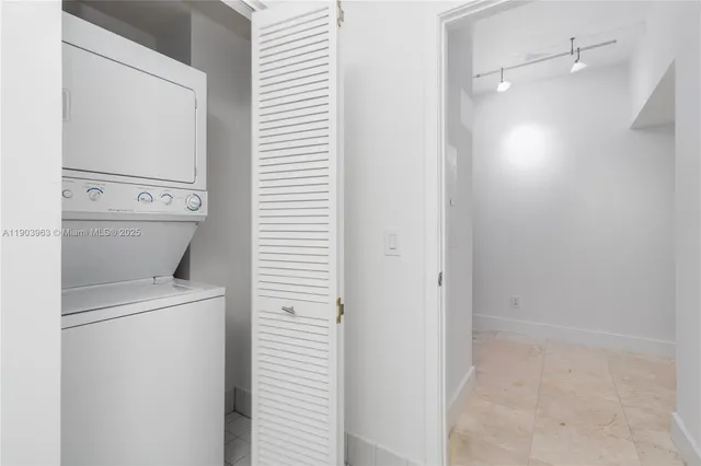 a view of a storage & utility room with washer and dryer