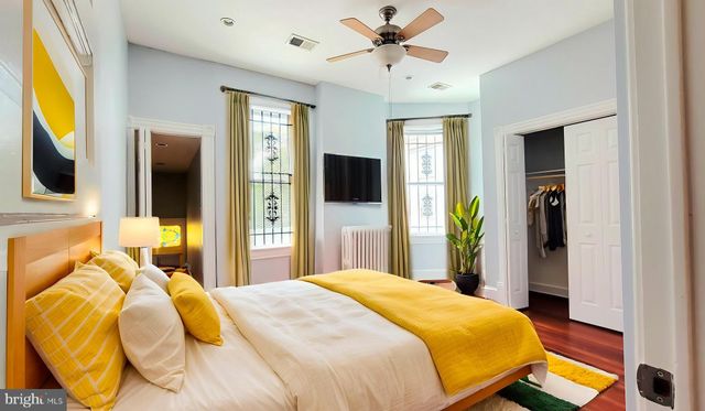 a bathroom with a toilet and a sink