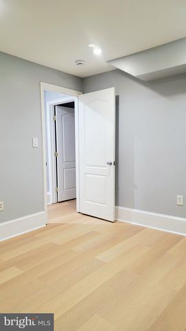 a view of living room with furniture and fireplace