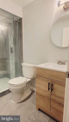 a view of kitchen with a large window