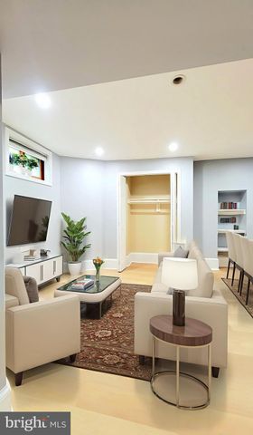 a view of a kitchen with furniture and cabinets