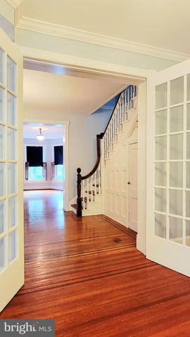 a picture of a room with a white wall and a white wall