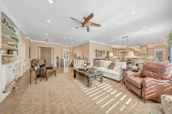 a bedroom with a large bed and a couch