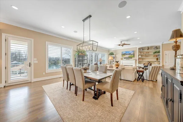 a large bathroom with a double vanity sink a large mirror and a shower