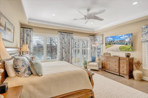 a bathroom with a double vanity sink and mirror with shower