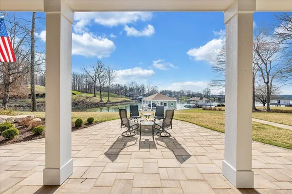 a living room with furniture cabinets and a flat screen tv