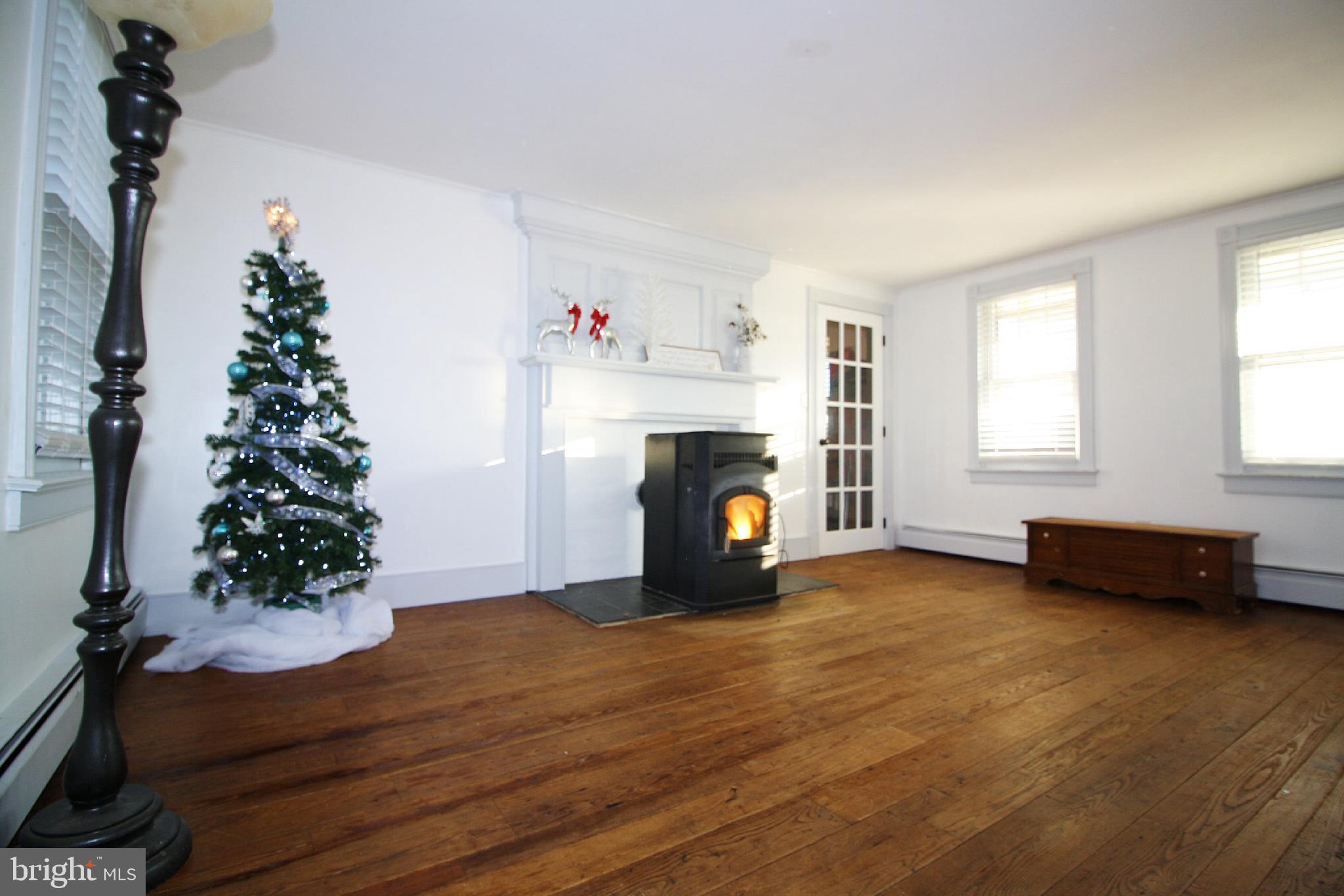 81 Davis Road New Park, PA 17352 - Photo 8 of 45 Living Room with Pellet Stove