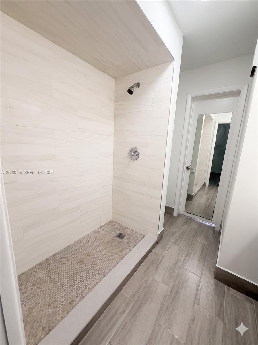 13 Southwest 3rd Street, Unit 13 Pompano Beach, FL 33060 - Photo 25 of 44 a view of hallway with wooden floor