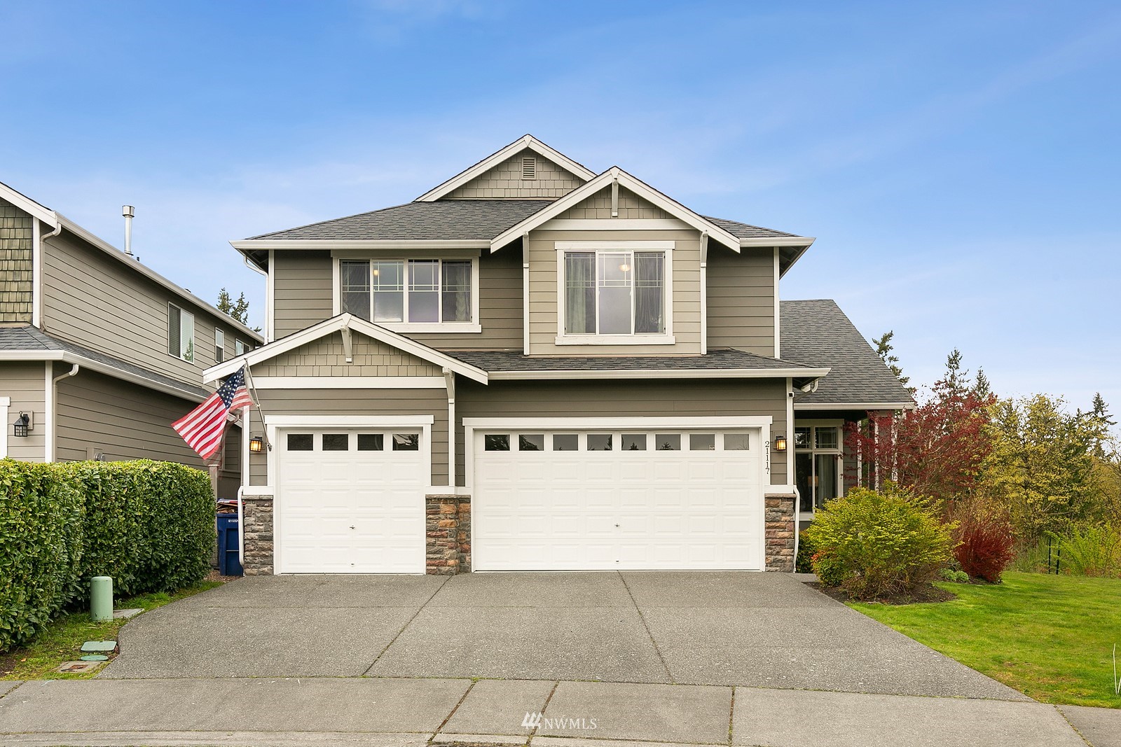 21117 Meridian Place West Bothell, WA 98021 - Photo 1 of 30 a front view of a house with a yard