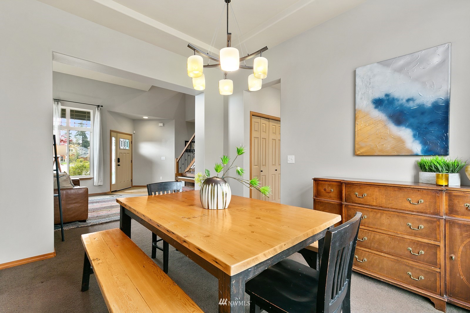 21117 Meridian Place West Bothell, WA 98021 - Photo 13 of 30 a view of a dining room and chandelier