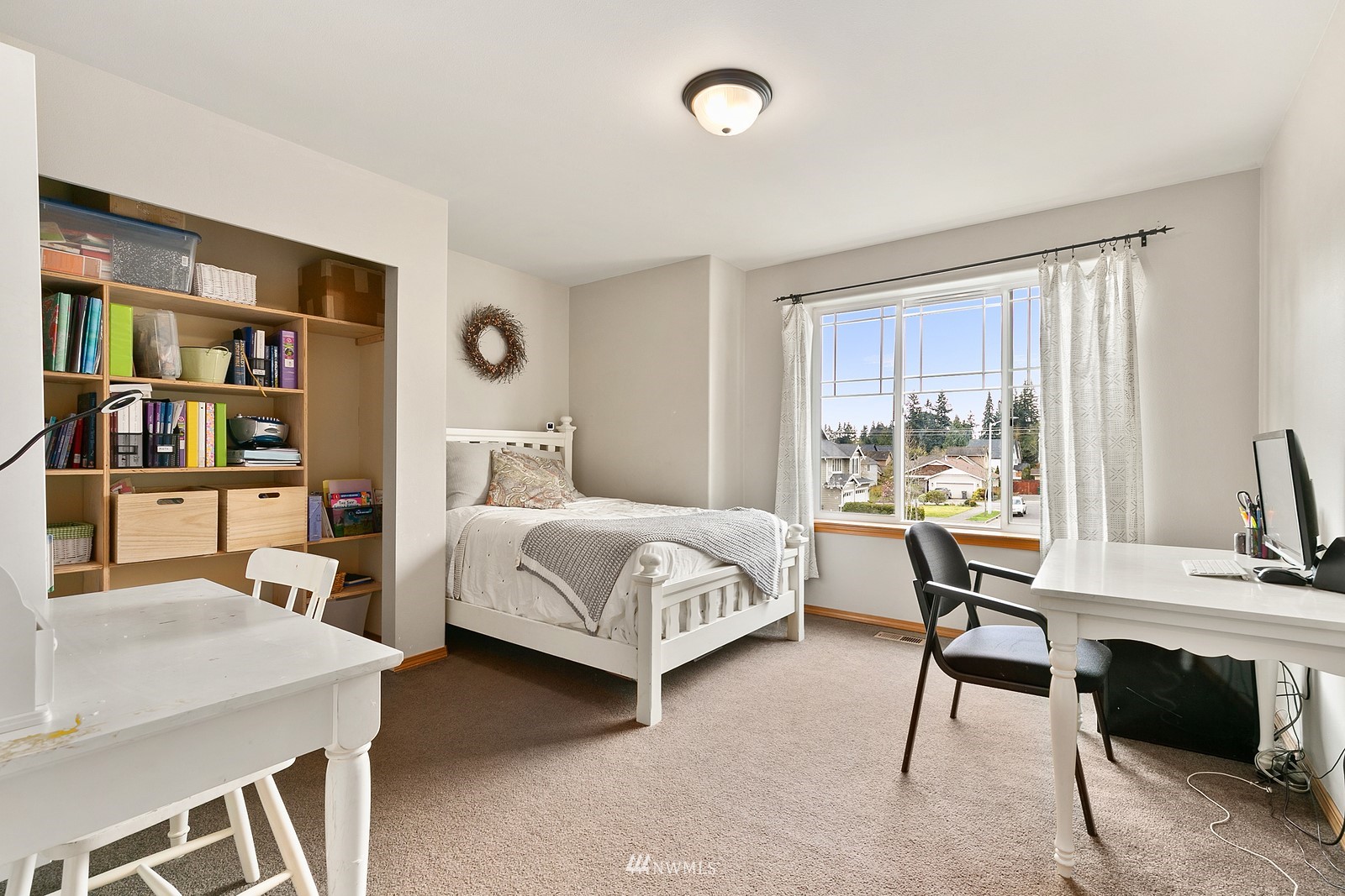21117 Meridian Place West Bothell, WA 98021 - Photo 14 of 30 a bedroom with a bed and a desk
