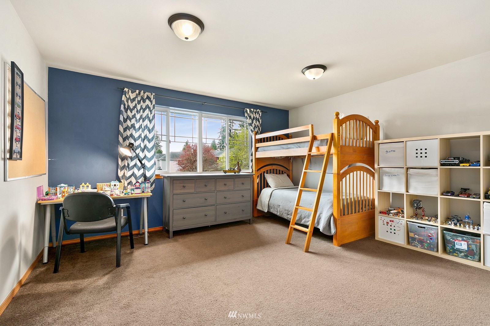 21117 Meridian Place West Bothell, WA 98021 - Photo 15 of 30 a bedroom with furniture and a window