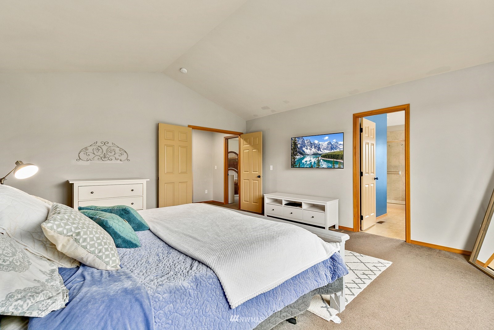 21117 Meridian Place West Bothell, WA 98021 - Photo 18 of 30 a bedroom with a bed and wooden floor