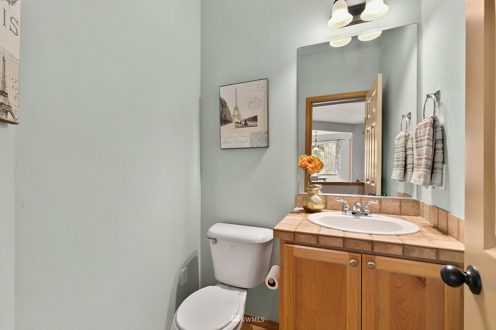 21117 Meridian Place West Bothell, WA 98021 - Photo 20 of 30 a bathroom with a toilet a sink and mirror