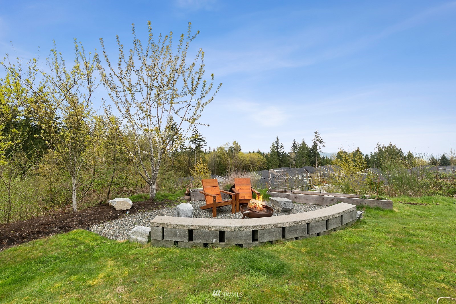 21117 Meridian Place West Bothell, WA 98021 - Photo 26 of 30 a view of a backyard with plants and a patio
