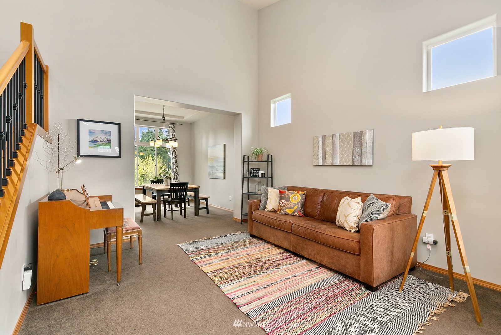 21117 Meridian Place West Bothell, WA 98021 - Photo 7 of 30 a living room with furniture and a lamp