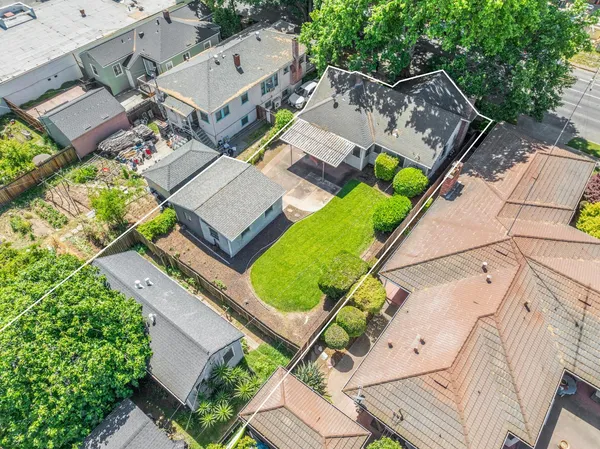 an aerial view of a house with a garden