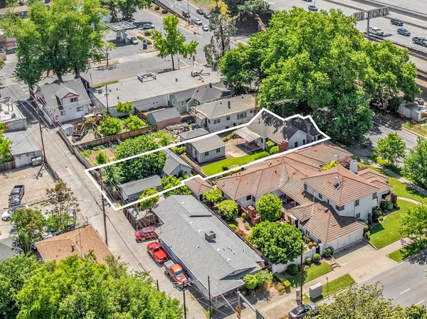 an aerial view of a house with a garden