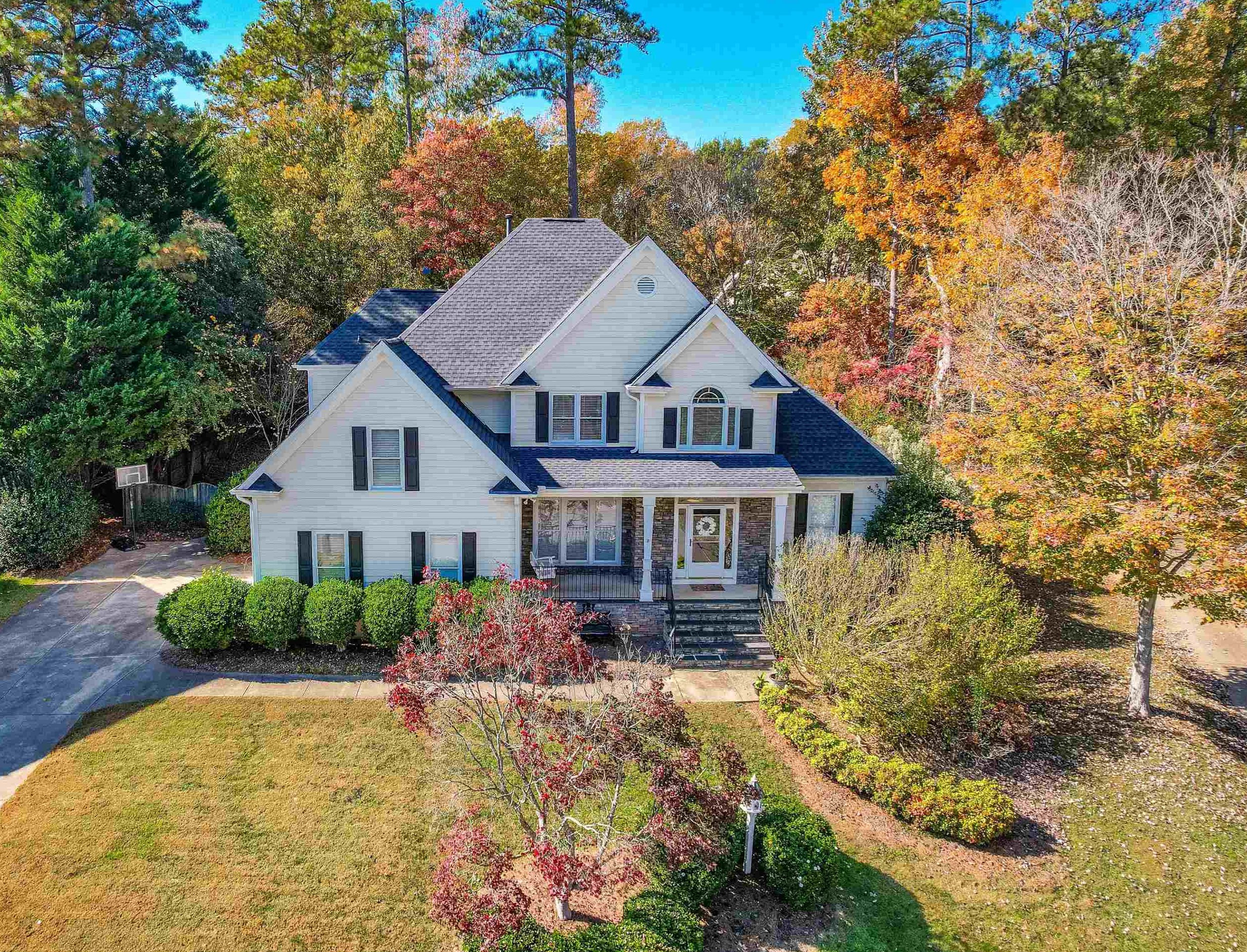 8215 Gadsen Court Raleigh, NC 27613 - Photo 1 of 48 a aerial view of a house with a yard and large trees