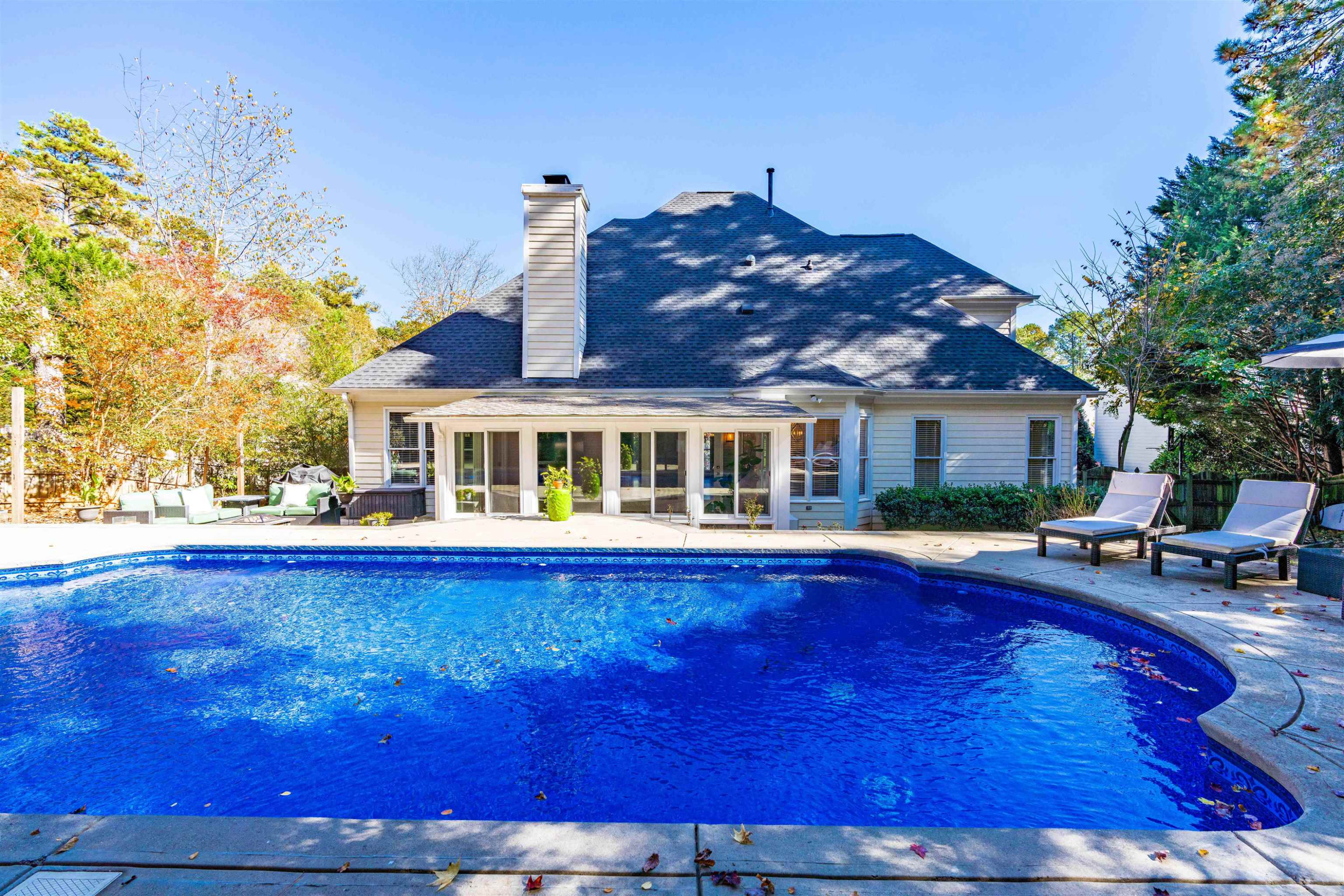8215 Gadsen Court Raleigh, NC 27613 - Photo 2 of 48 a front view of house with yard and swimming pool