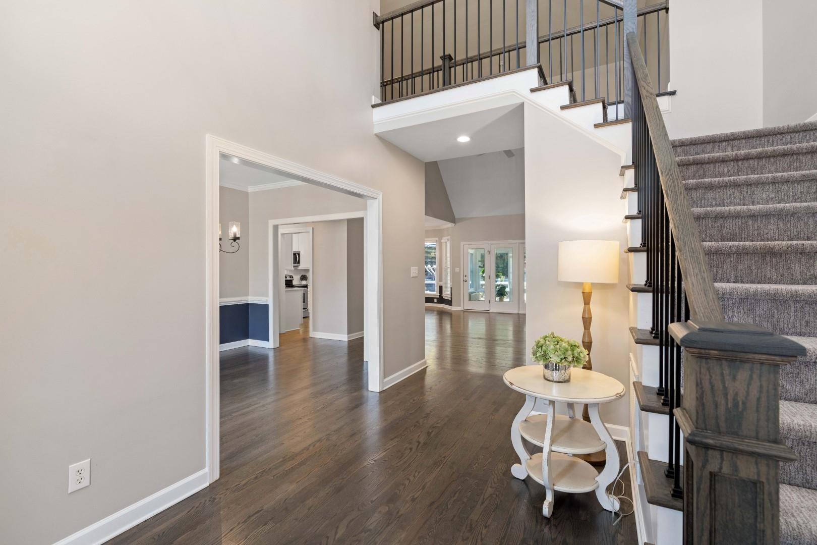 8215 Gadsen Court Raleigh, NC 27613 - Photo 3 of 48 a view of a dining room with furniture and wooden floor