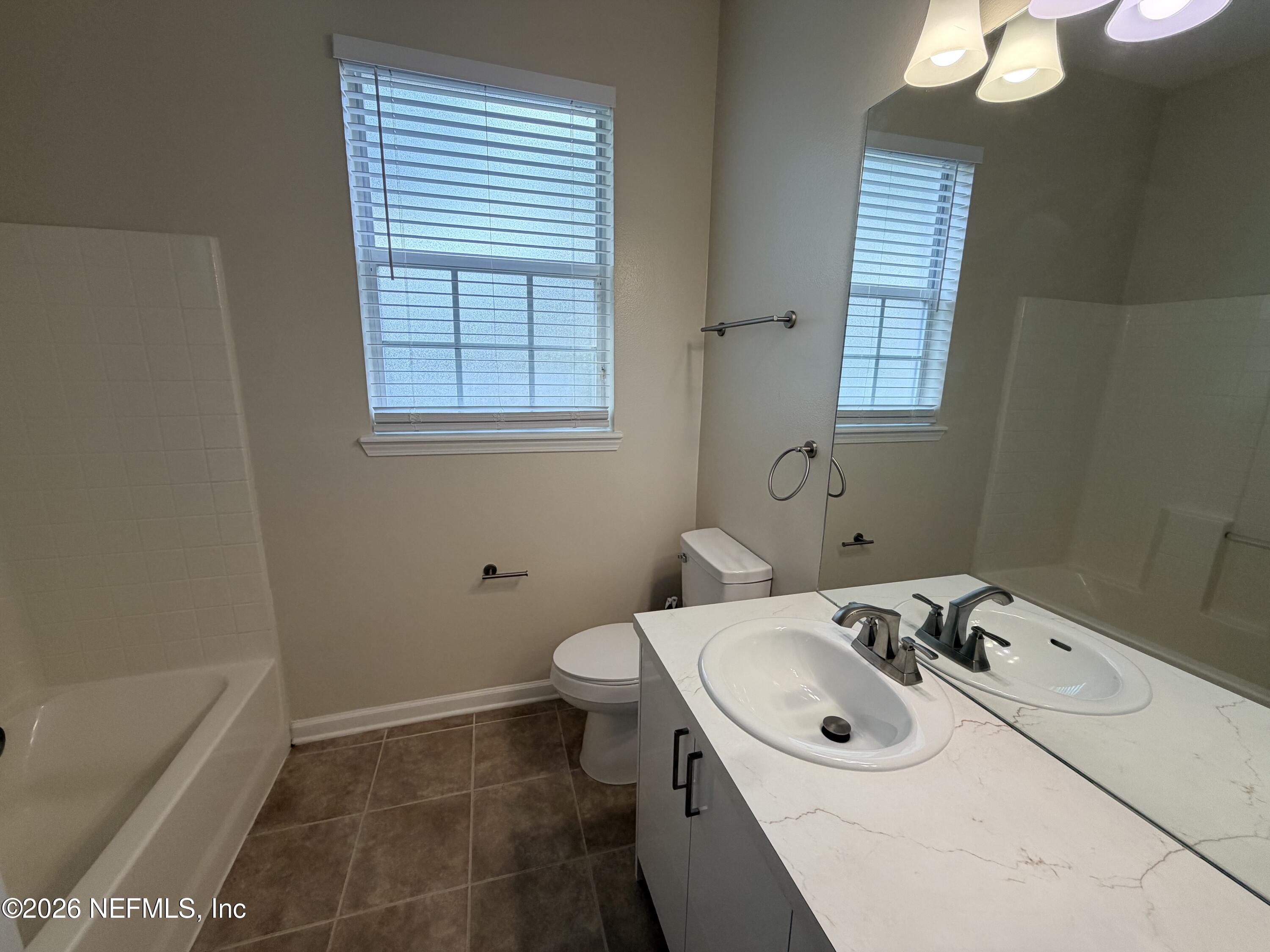 7990 Baymeadows Road East, Unit 1111 Jacksonville, FL 32256 - Photo 13 of 25 hall bath