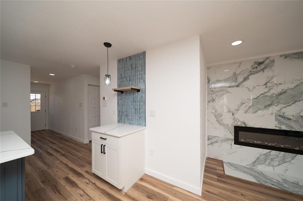 312 North Retta Street Fort Worth, TX 76111 - Photo 11 of 30 a bathroom with a sink and a mirror