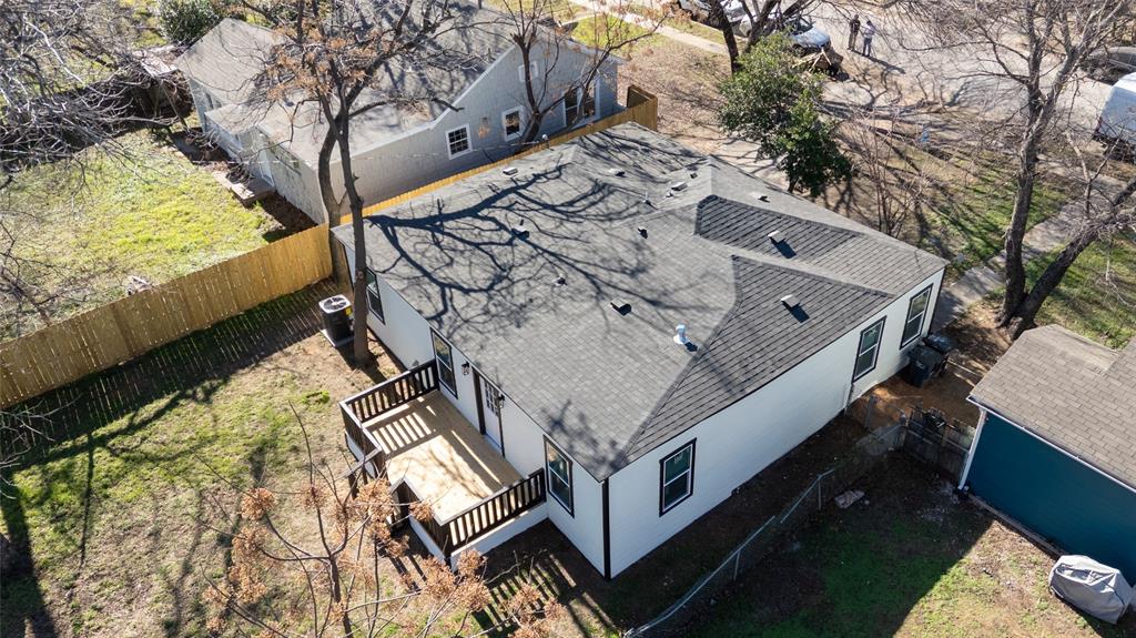 312 North Retta Street Fort Worth, TX 76111 - Photo 26 of 30 a view of a house with a yard