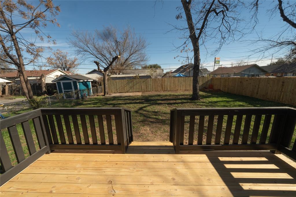 312 North Retta Street Fort Worth, TX 76111 - Photo 30 of 30 a view of a brick house with a large window