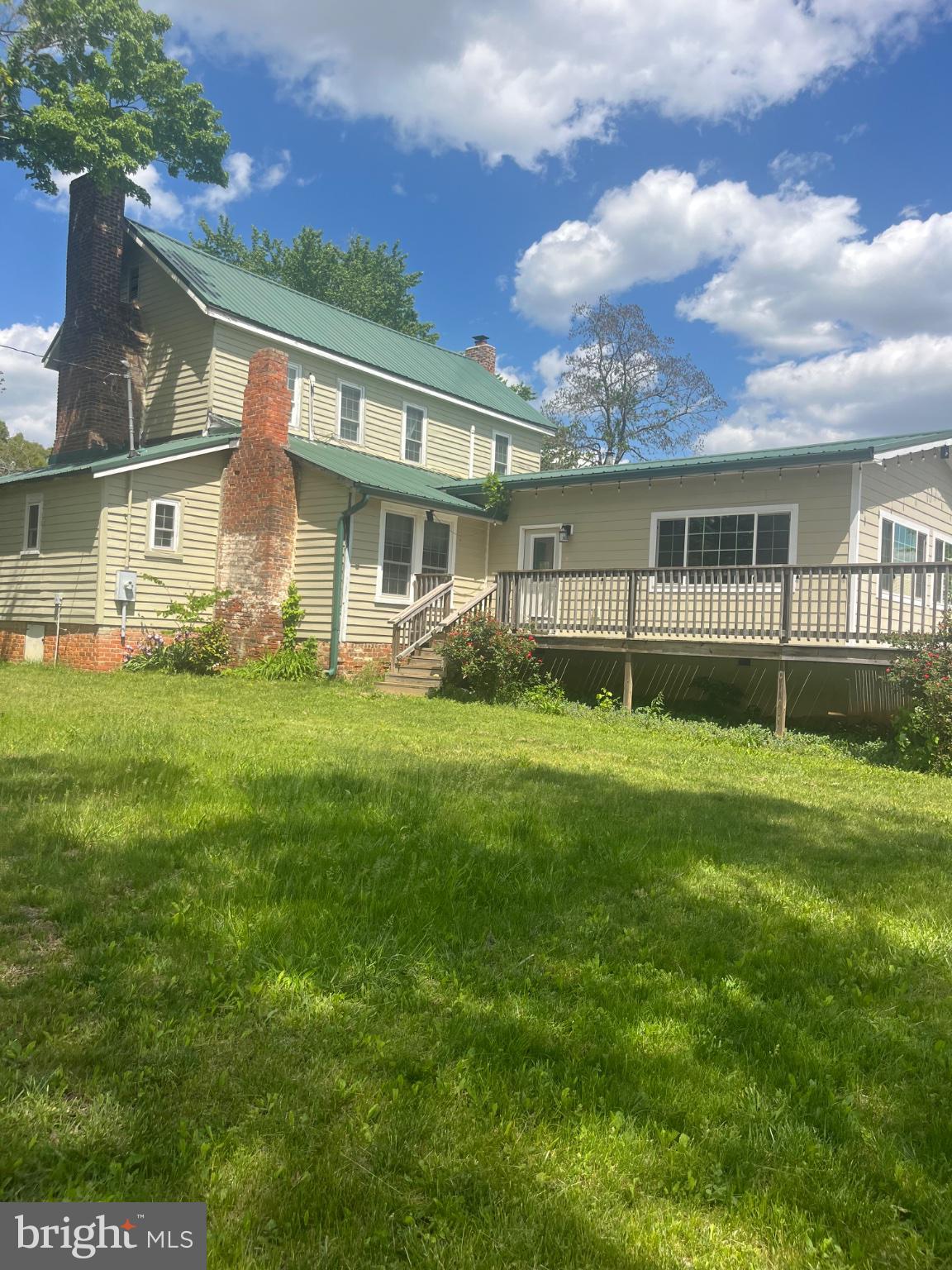 940 Ambler Road Louisa, VA 23093 - Photo 12 of 18 Charming home with lush green surroundings.