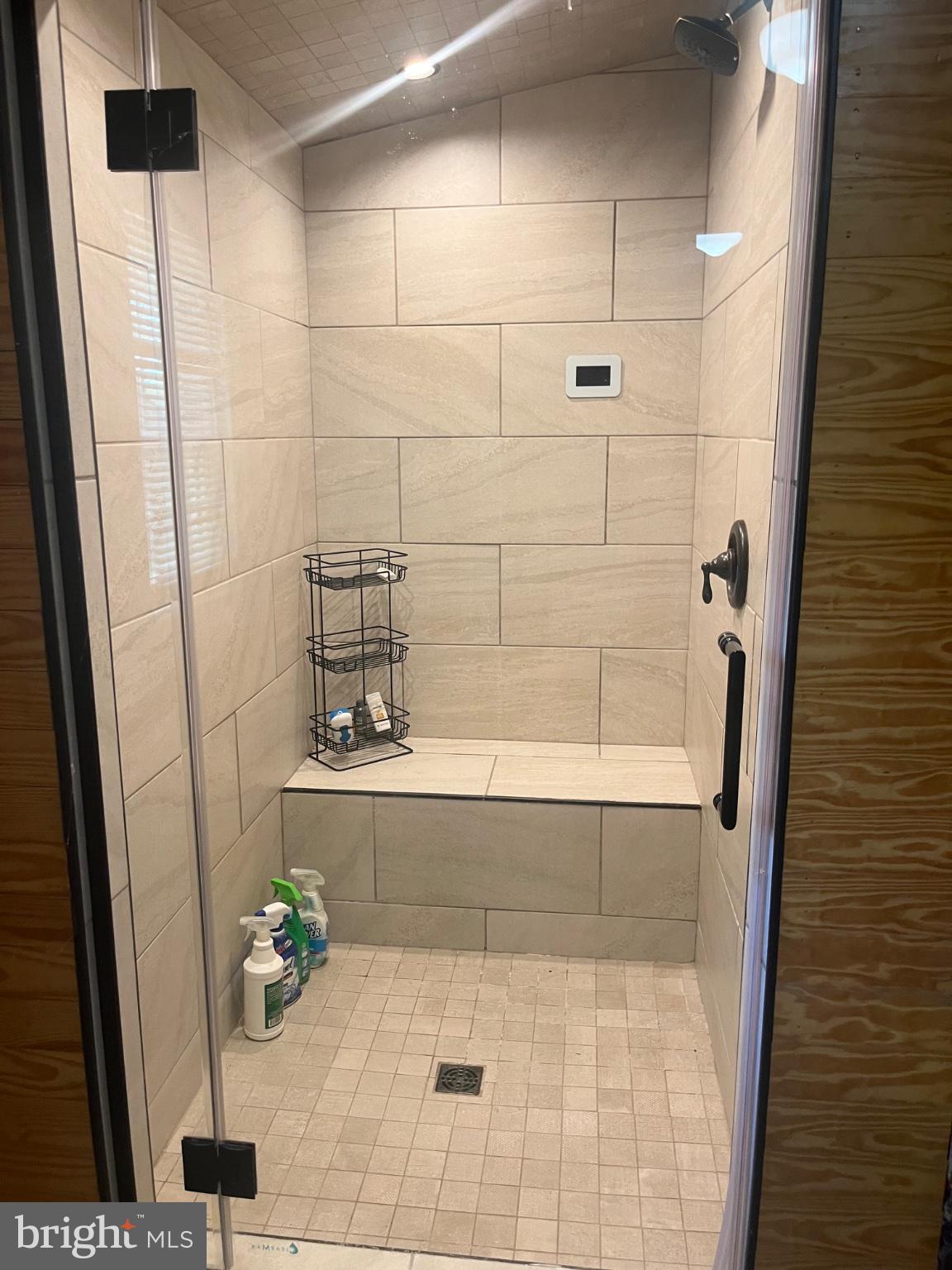 940 Ambler Road Louisa, VA 23093 - Photo 17 of 18 Sleek modern shower with elegant tiles.
