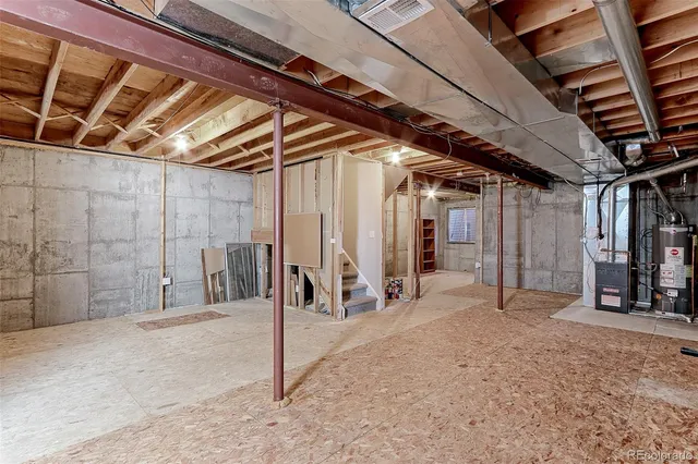 a view of a room with wooden walls