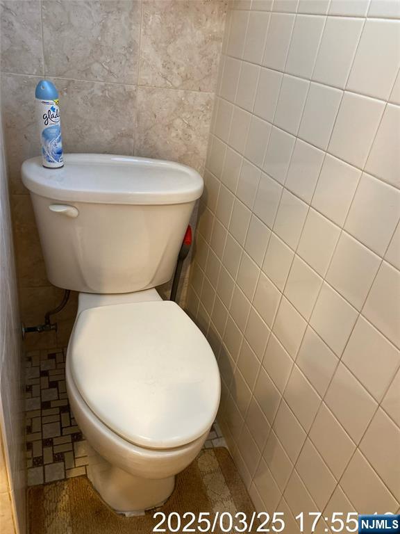 81 Waydell Street Newark, NJ 07105 - Photo 23 of 29 a bathroom with a toilet and a sink