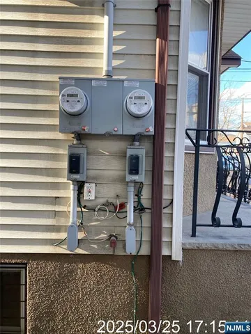 a view of a storage room with a fridge