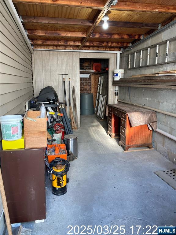 81 Waydell Street Newark, NJ 07105 - Photo 9 of 29 a view of a storage room with a fridge