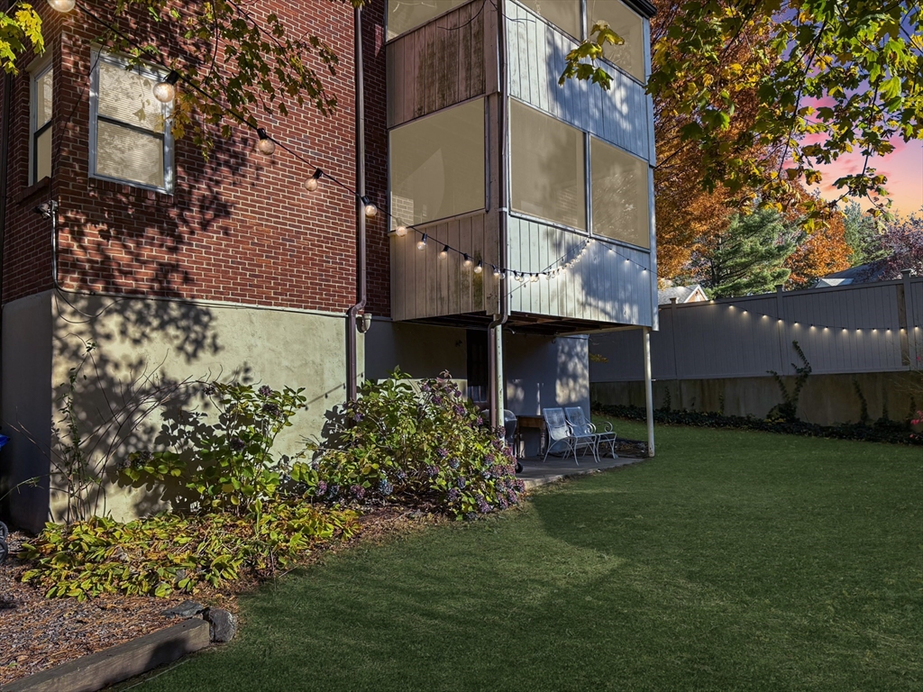 675 Chestnut Hill Avenue Brookline, MA 02445 - Photo 21 of 23 a view of a house with a yard and sitting area