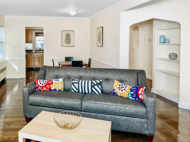 a living room with furniture and a couch