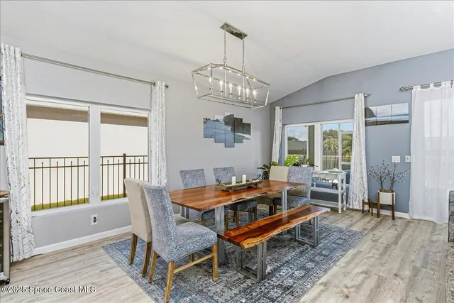 a view of a chairs and table in the patio