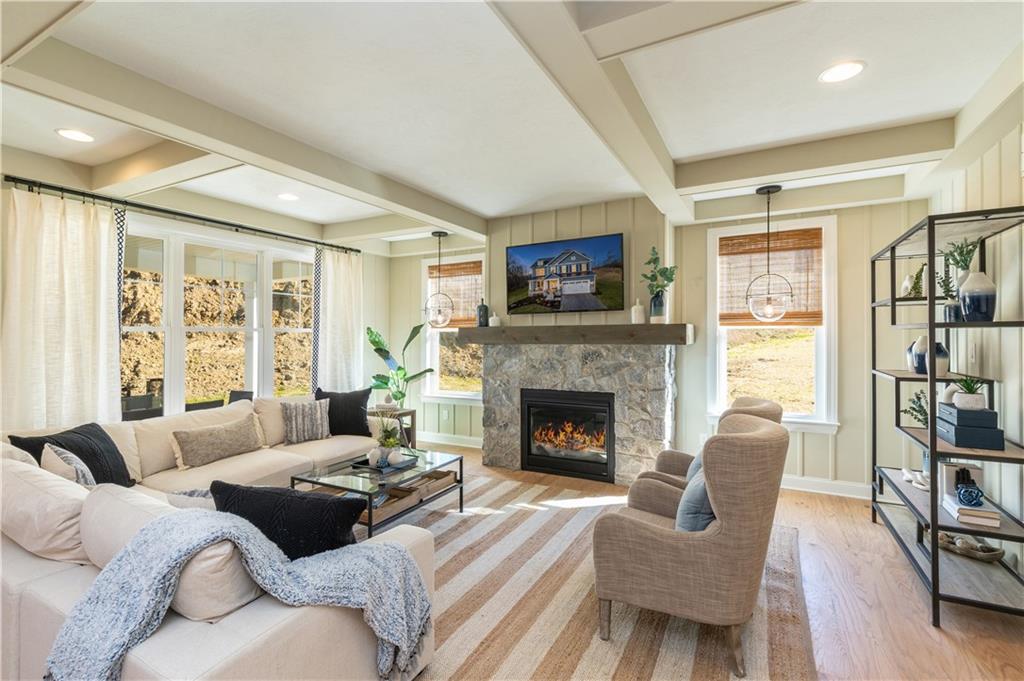 103 Maggie Drive Eighty Four, PA 15330 - Photo 12 of 23 a living room with furniture and a fireplace