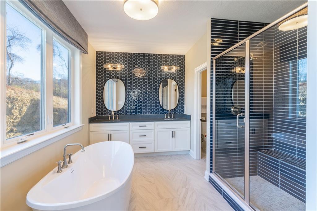 103 Maggie Drive Eighty Four, PA 15330 - Photo 16 of 23 a bathroom with a toilet sink and mirror