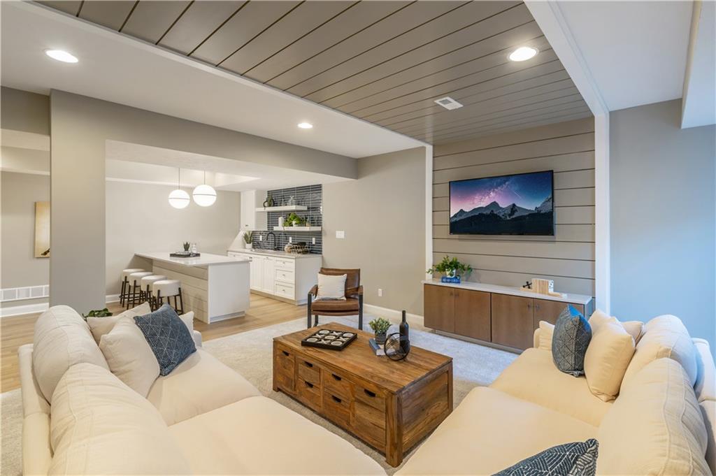 103 Maggie Drive Eighty Four, PA 15330 - Photo 21 of 23 a living room with furniture and a flat screen tv