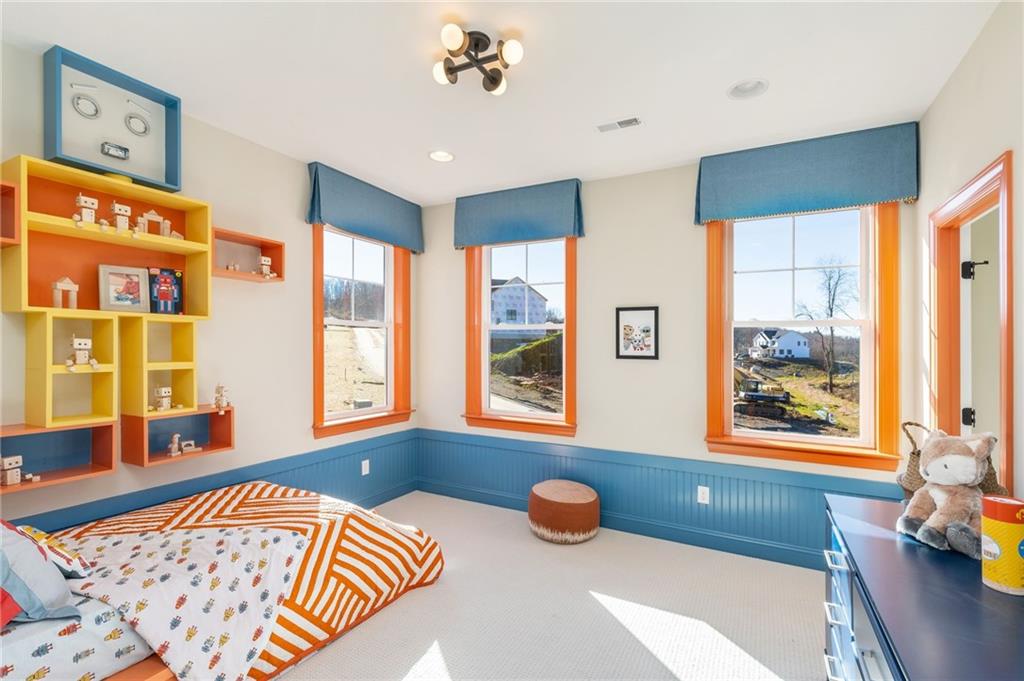 103 Maggie Drive Eighty Four, PA 15330 - Photo 23 of 23 a bedroom with furniture and a large window