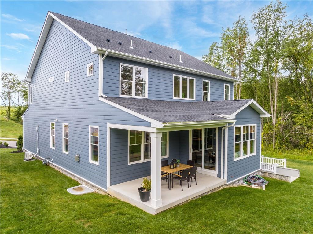 103 Maggie Drive Eighty Four, PA 15330 - Photo 3 of 23 a view of a house with a yard and sitting area