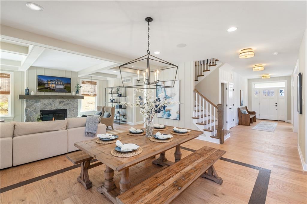 103 Maggie Drive Eighty Four, PA 15330 - Photo 5 of 23 a living room with furniture a fireplace and a table