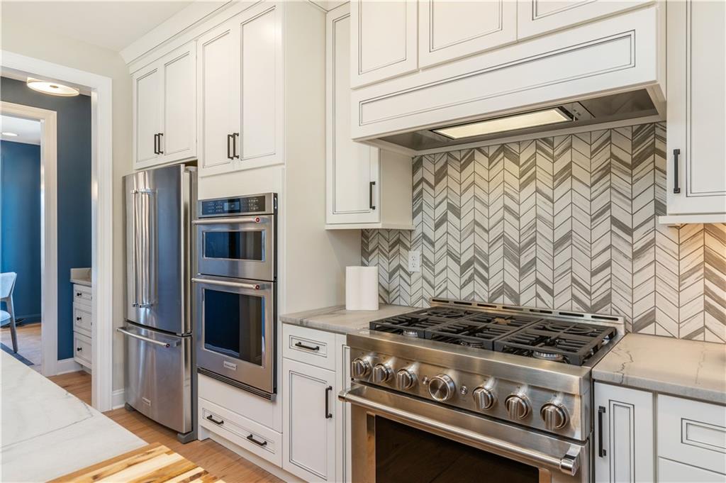 103 Maggie Drive Eighty Four, PA 15330 - Photo 9 of 23 a stove top oven sitting inside of a kitchen