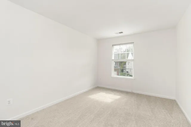 a bathroom with a sink vanity and a mirror