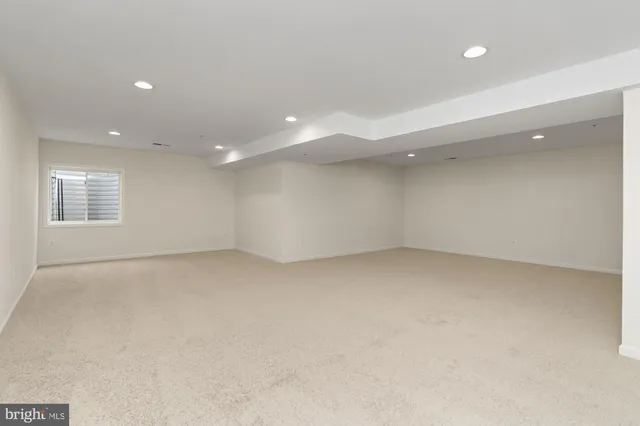 a view of a house with wooden deck