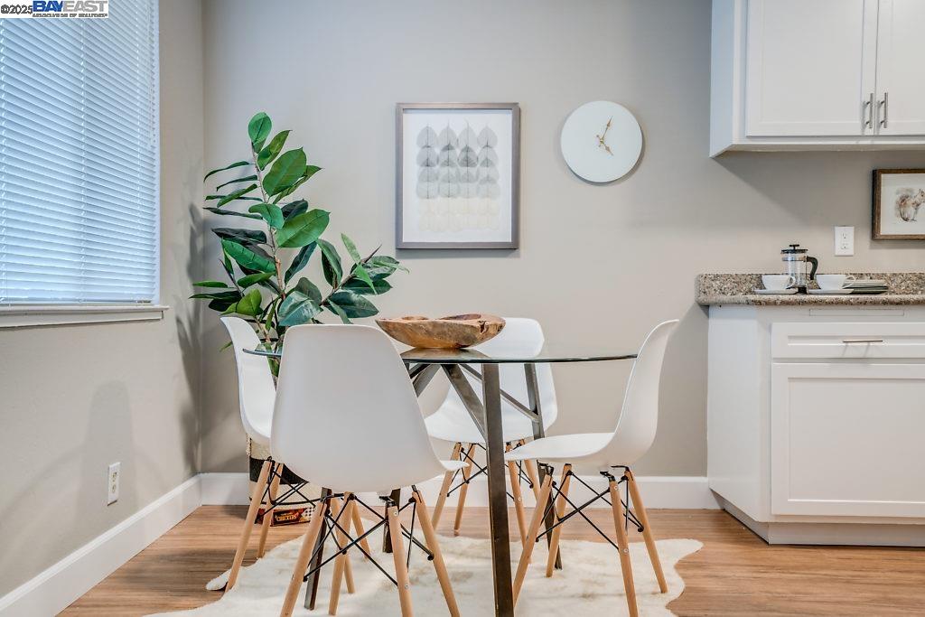 2093 Mt Diablo Street Concord, CA 94520 - Photo 11 of 16 a view of a dining room with furniture and a potted plant