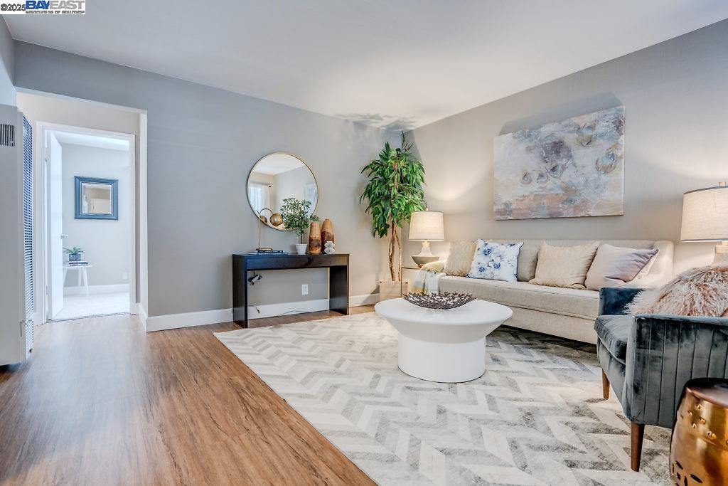 2093 Mt Diablo Street Concord, CA 94520 - Photo 14 of 16 a living room with furniture and a painting on the wall